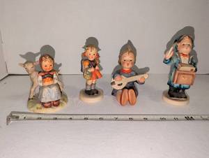 lot 1065 image: Lot of Goebel Hummel Child Figurines with Goat and Musical Instruments