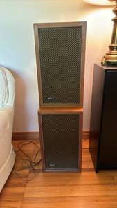lot 1111 image: Sony Bookshelf Speaker Pair with Wood Cabinet and Grille 19 12 x 11 12