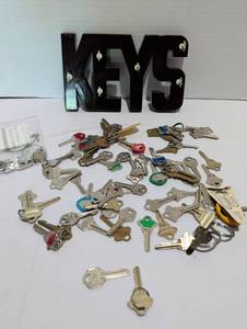 lot 1209 image: KEY5 Black Metal Key Holder with Approximately 40 Assorted Keys