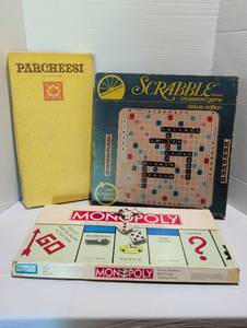 lot 1218 image: Lot of 3 Board Games Parcheesi, Scrabble Deluxe, Monopoly