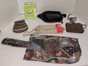 lot 1228 image: On The Go Waist Security Pouch and bags Lot