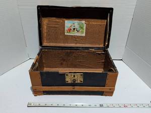 lot 1249 image: Doll or child tiny Steamer trunk with metal banding and brass hardware