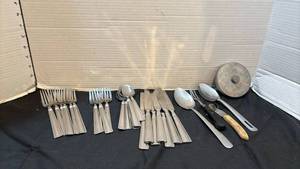 lot 1313 image: Flatware Set Forks Spoons Knives, and more.