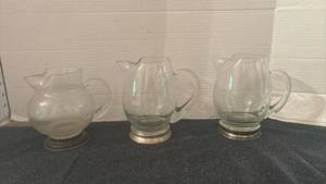 lot 1407 image: Glass Pitcher Lot 3 Pieces with Handles