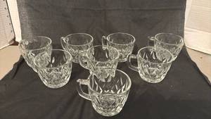 lot 1424 image: Set of 7 Glass cups with Handles and Embossed Pattern