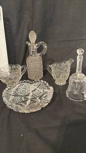lot 1425 image: Glass Tableware Lot Pitcher Cruet Serving Bowl Bell Cut Pressed Pattern