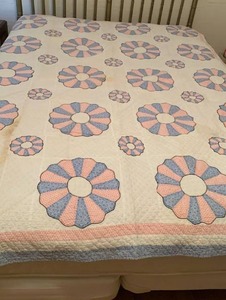 lot 1634 image: Machine and hand stitched Quilt with Blue and pink Flower Pattern 80X67 some stains