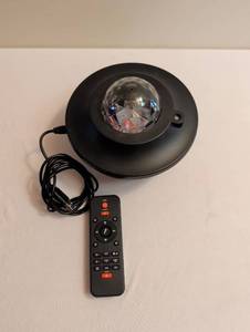 lot 1733 image: LED Disco Ball Light Projector Speaker with Remote Control Model BL-XK01
