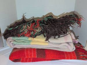 lot 1768 image: Lot of 3 Wool Blankets and Throws some with Fringe Trim