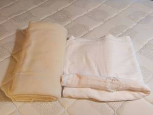 lot 1769 image: 2 Cream and White Blankets, one with damage