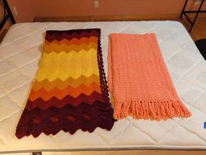 lot 1770 image: Two Knit Throw Blankets - Chevron and Solid. Note slight damage.