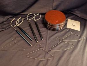 lot 1812 image: 4 American Girl doll stands and clothing hangers