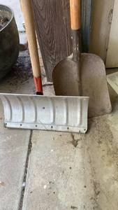 lot 2000 image: Snow Shovel with Wood Handle and straight shovel