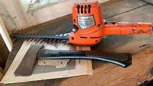 lot 2010 image: Black and Decker hedge trimmer and Kobalt axe
