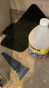 lot 2031 image: Car floor mats, rainy and ice scraper