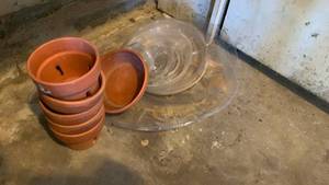 lot 2033 image: Lot of 5 Terra Cotta Planters and Clear Plastic Plant Saucers