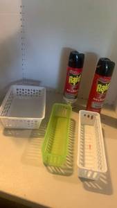 lot 2123 image: Ant and roach sprays and organizers