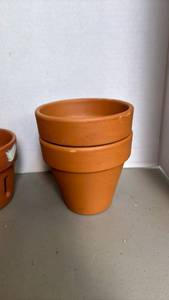 lot 2202 image: Three orchid pots and two regular terra cotta pots