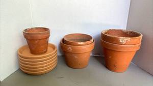 lot 2203 image: Terracotta pots and saucers