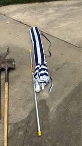 lot 2208 image: Patio Umbrella Navy White Striped 9 ft and extender pole