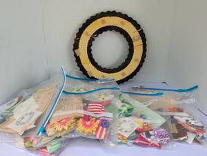 lot 2427 image: Thru The Year Wreath Wooden Wreath with Holiday Decoration Packages