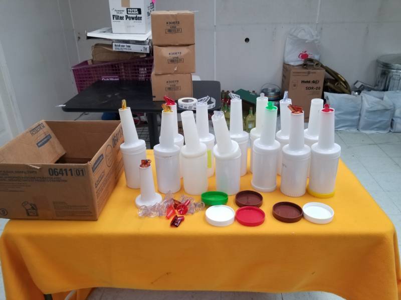 lot 6202 image: Thirteen Salad Dressing Dispensing Bottles and Extra Parts