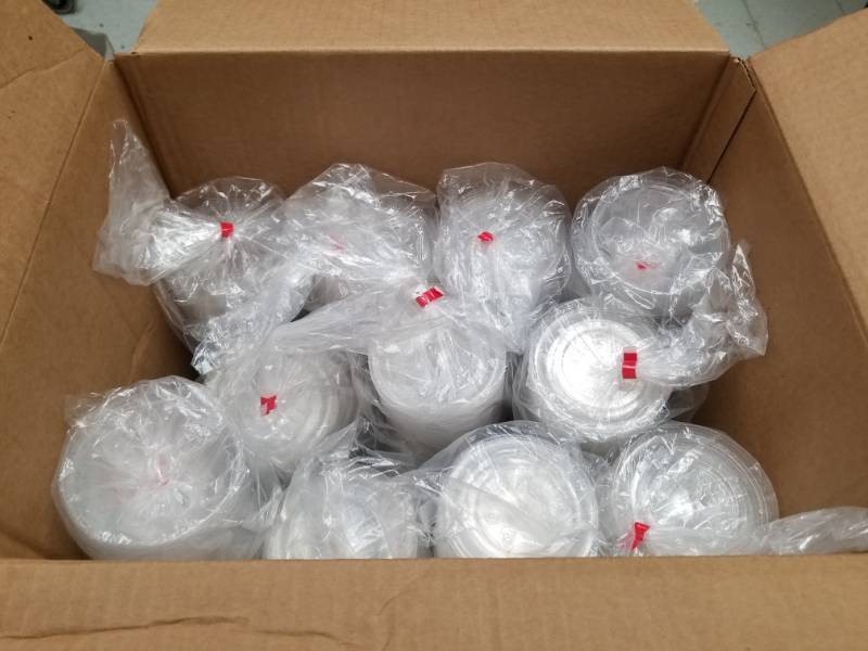 lot 6373 image: Box Full of Clear Plastic Dome Lids and Lids