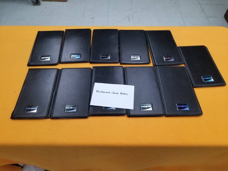 lot 6377 image: Lot of 11 Restaurant Check Holders