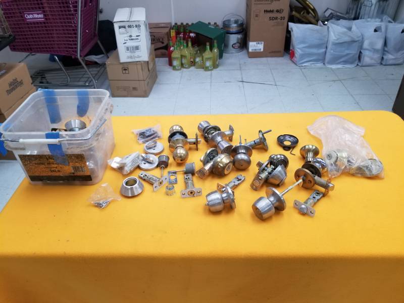 lot 6380 image: Box of Commercial Door Handle Deadbolt Pieces and Parts