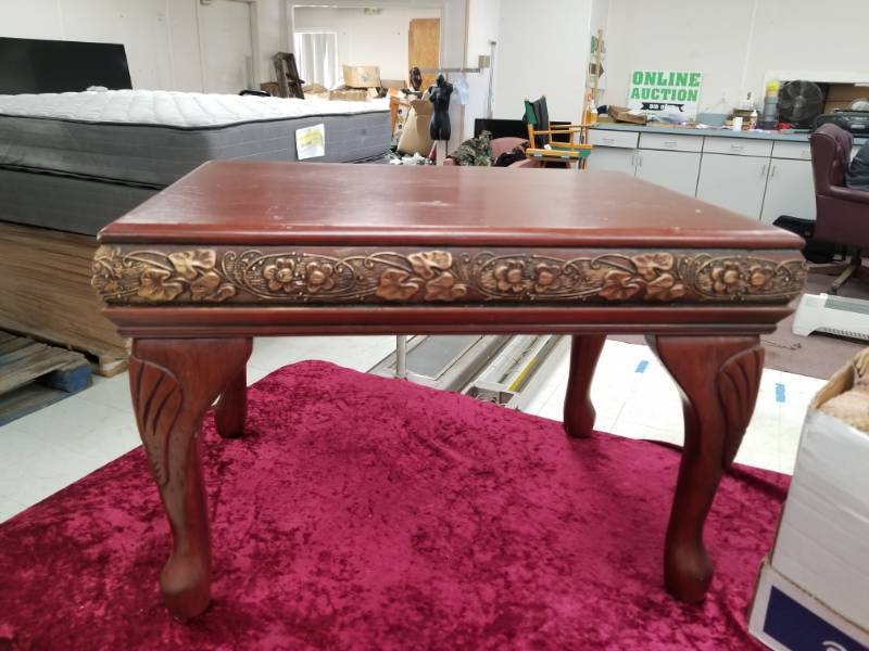 lot 6576 image: Wood End Table and Box of Misc Rugs