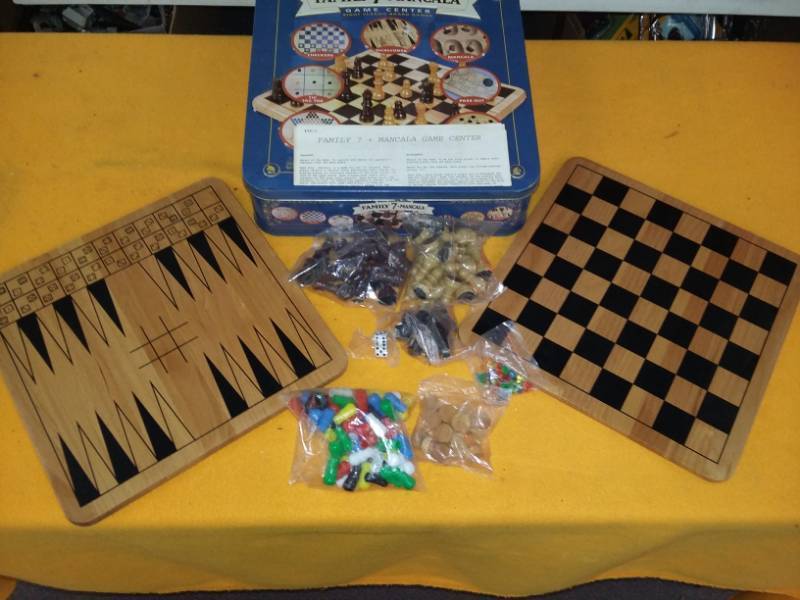 lot 6121 image: Family 7  Mancala Game in Metal Box
