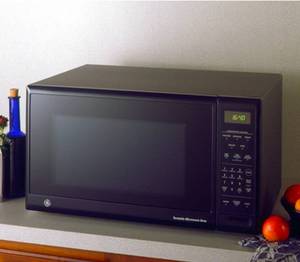 lot 20781 image: GE Turntable Microwave Oven Black - Retail $100