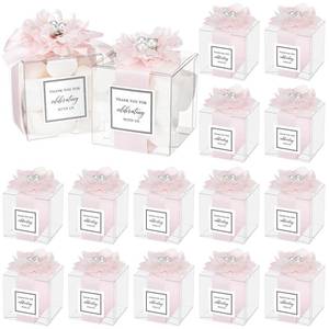 lot 254 image: Wenqik 20 Pack Clear Wedding Favor Boxes with Light Pink Pearl Flowers, Ribbon and Thank You Stickers, Elegant Plastic Candy Gift Boxes for Bridal Shower Baby Shower, Birthday Wedding Supplies - Retail $18