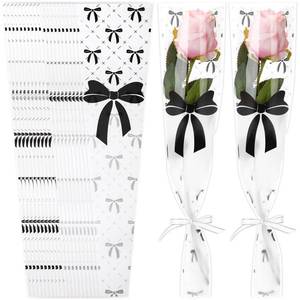 lot 655 image: Honoson 100 Pcs Single Flower Sleeve Coquette Bow Mothers Day Floral Bouquets Wrapping Bags Plastic Rose Cellophane for Birthday Graduation Party Wedding Flower Gifts Supplies (Black) - Retail $9