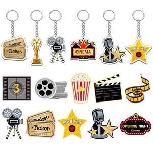 lot 728 image: Taiyin 12 Pieces Movie Night Party Supplies Acrylic Movie Keychains Now Showing Party Supplies Camera Clapboard Microphone Ticket Film Keychain Souvenirs Gift Christmas Gifts - Retail $12