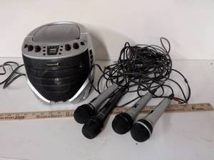 lot 35 image: Karaoke USA Portable CD Karaoke Player with 3 Microphones