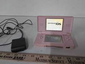lot 56 image: Nintendo DS Lite Pink Handheld Gaming Console USG-001