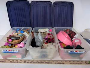 lot 82 image: Tucker 3-Pack Plastic Storage Containers with Assorted Doll Accessories and Clothing