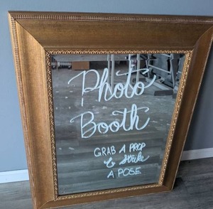 lot 1100 image: Framed Gold Mirror 28 x 24 inches (chalk marker writing wipes off)