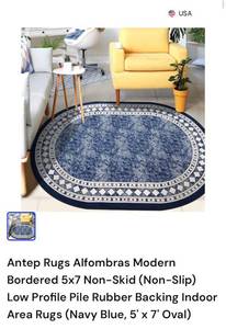 lot 1664 image: 5x7 Blue Oval Rug
