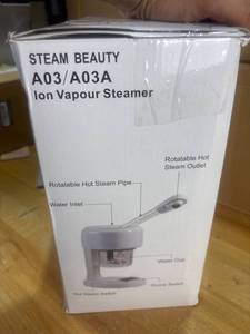 lot 1710 image: Ozone and Ion Vapor Mini Steamer
