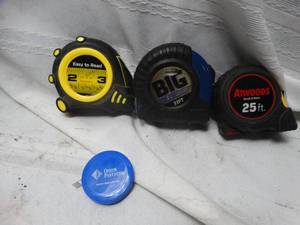 lot 25242 image: lot of four tape measures