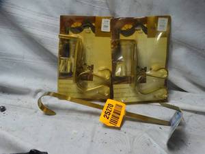 lot 25270 image: Golden Curtain hangers