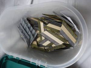 lot 25205 image: Paper taped nails for nail gun and Misc hardware
