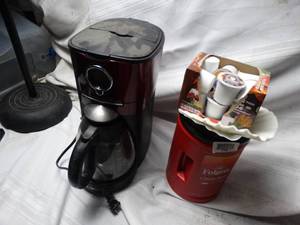 lot 27936 image: Mr. Coffee Coffee machine RED , folgers coffee grounds, and k-cups