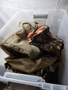 lot 27858 image: Lot of uniforms duffle bag camo uniforms