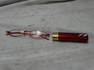 lot 26249 image: Red thin framed glasses , with half of a hard shelled case