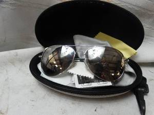 lot 26251 image: Sun glasses, Hardshelled travel case, and lens cleaning supplies