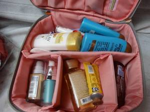 lot 26266 image: Lot of travel bathroom supplies and travel case
