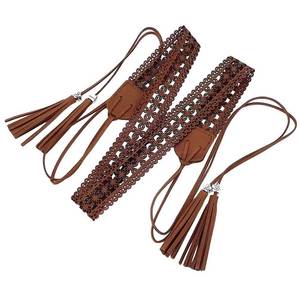 lot 98 image: CALFOVERA 66.54 x 1.12 Inch PU Leather Boho Braided Tassel Belt Vintage Bohemian Hollow Knotted Waistband with Wax Rope Western Ethnic Macrame Waist Belt for Women Dress Skirt (Coconut Brown) - Retail $8